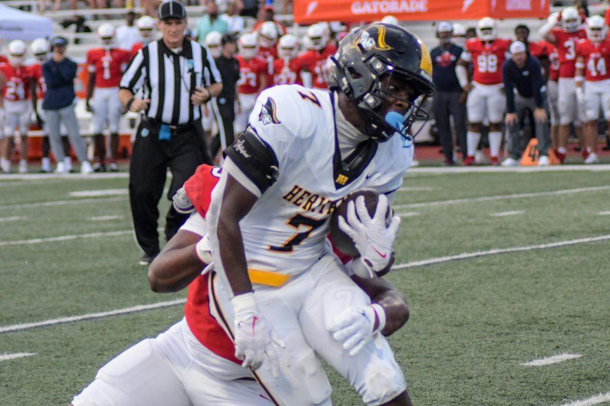 American Heritage running back Byron Louis carries the ball against Milton on Friday, Aug. 23, 2024, in a Broward County High School National Football Showcase game at St. Thomas Aquinas in Fort Lauderdale, Florida.