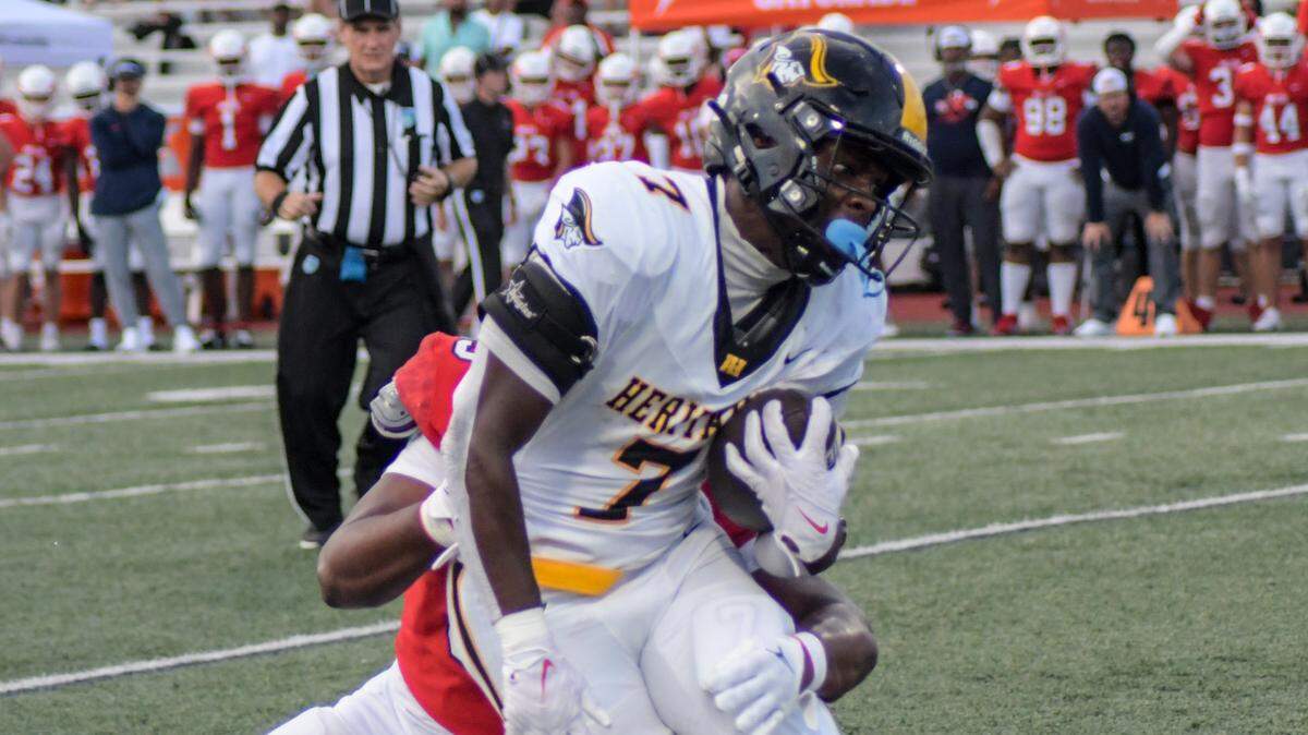 American Heritage running back Byron Louis carries the ball against Milton on Friday, Aug. 23, 2024, in a Broward County High School National Football Showcase game at St. Thomas Aquinas in Fort Lauderdale, Florida.