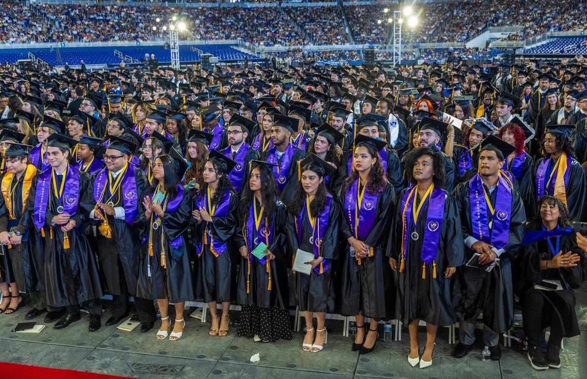 Graduating students celebrate during Miami Dade College’s North, Hialeah and West Campuses 2025 commencement ceremonies at LoanDepot Park, in Miami on Saturday, April 26, 2025.
