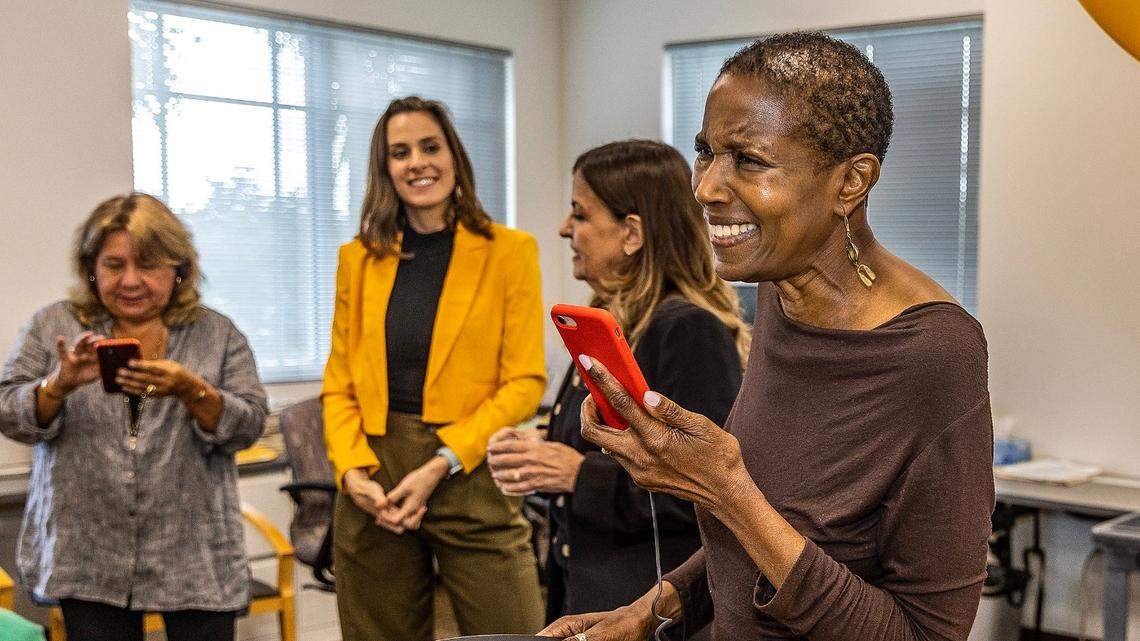 The Miami Herald editorial board members, left to right, Luisa Yanez, Isadora Rangel, Amy Driscoll and Nancy Ancrum react after Driscoll’s “Broken Promises,” series won the Pulitzer Prize on May 8..