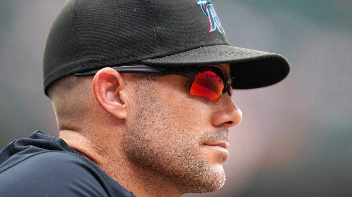 Miami Marlins manager Skip Schumaker (55) watches first inning action against the Baltimore Orioles at Oriole Park at Camden Yards.