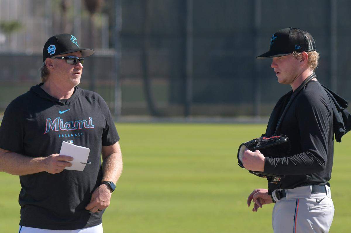 Miami Marlins pitching coach Mel Stottlemyre Jr. speaks with right-handed pithcer Nic Enright on Tuesday, Feb. 14, 2023, at the Roger Dean Chevrolet Stadium complex in Jupiter, Florida.