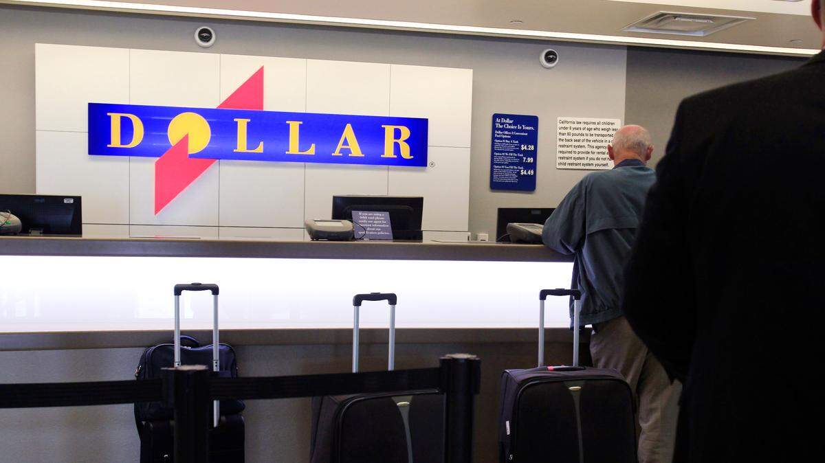 The parent company of Dollar and Thrifty rental car companies has settled a dispute over toll fees with the state of Florida.