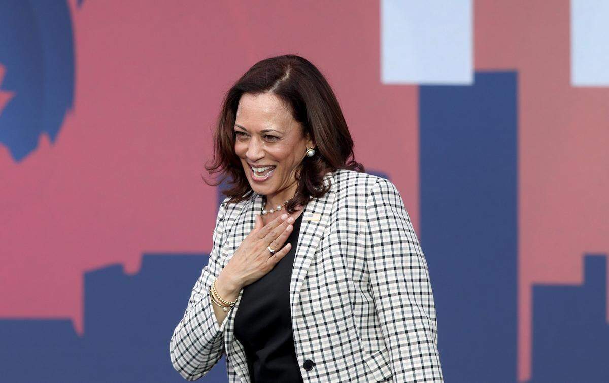 Vice President Kamala Harris reacts as she speaks during a drive-in rally she held at FIU South Campus in Miami as she campaigns ahead of November 3rd Election Day in South Florida on Saturday, October 31, 2020