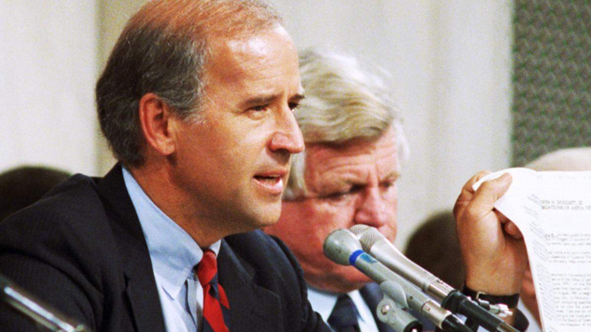 In 1991, Joe Biden, Senate Judiciary Committee chairman, holds up an FBI report while aggressively questioning Anita Hill in 1991.
