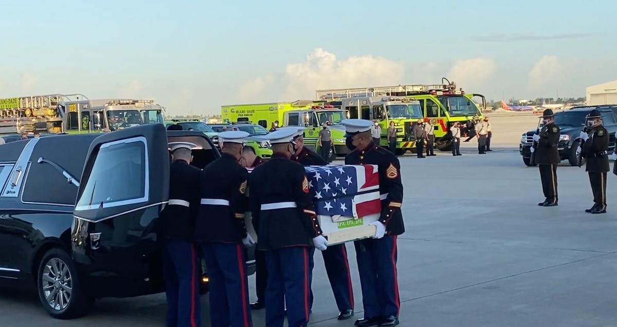 U.S. Marine Corps soldiers at Miami International Airport on Oct. 30, 2020, carry a casket with the body of Marine Pvt. First Class Bruce W. Carter, a Medal of Honor recipient, whose remains were exhumed from a local cemetery after 50 years and laid to rest on Nov. 4 at Arlington National Cemetery in Virginia.