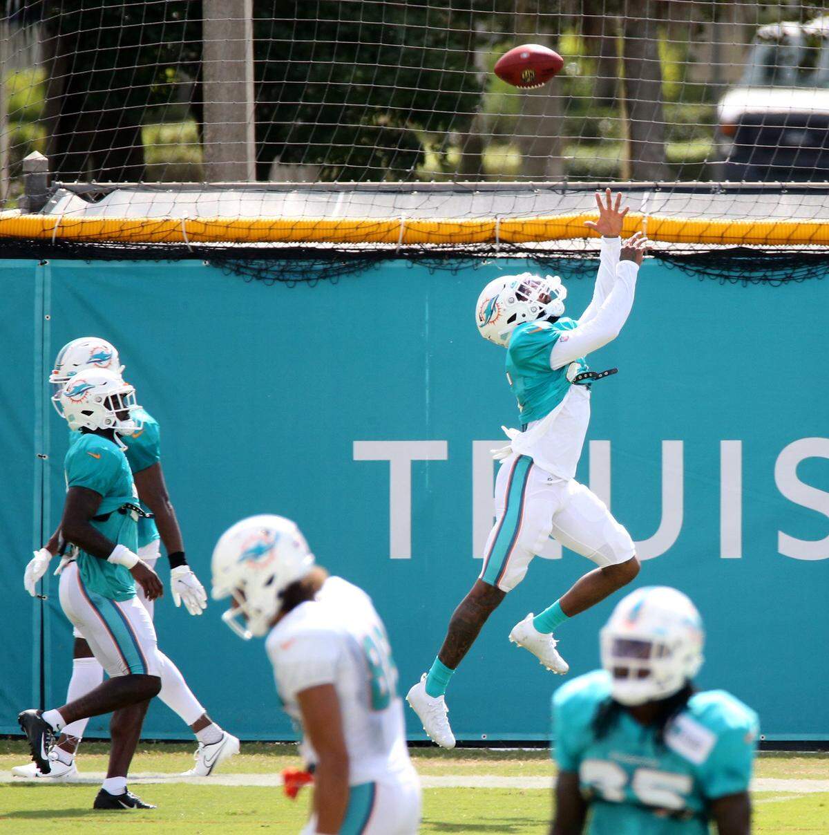 Miami Dolphins cornerback Xavien Howard (25) leaps for a ball at their training facility in Davie, Florida, August 28, 2020.