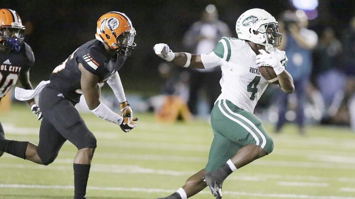 Miami Central Rockets’ running back Lexington Joseph (4) during the Region 4-6A semifinal football game against Carol City Chiefs on Nov. 16 at Traz Powell Stadium.