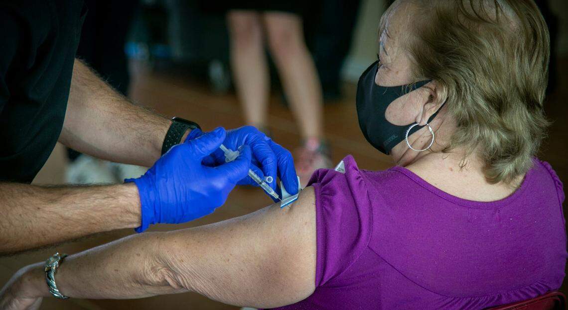 A resident of Daisy and Rosa (City of Hialeah Senior Housing Building), 1340-1370 West 26th Place, Hialeah, receives her Pfizer Covid-19 vaccine on Friday, Feb. 12. The vaccines are being administered at four City of Hialeah Housing Buildings, Villa Aida, 26 W. Sixth St.; Daisy and Rosa; Ruth Tinsman, 6545 W. 24th Ave.; and Affordable Housing Building, 1655 W. 56th St.