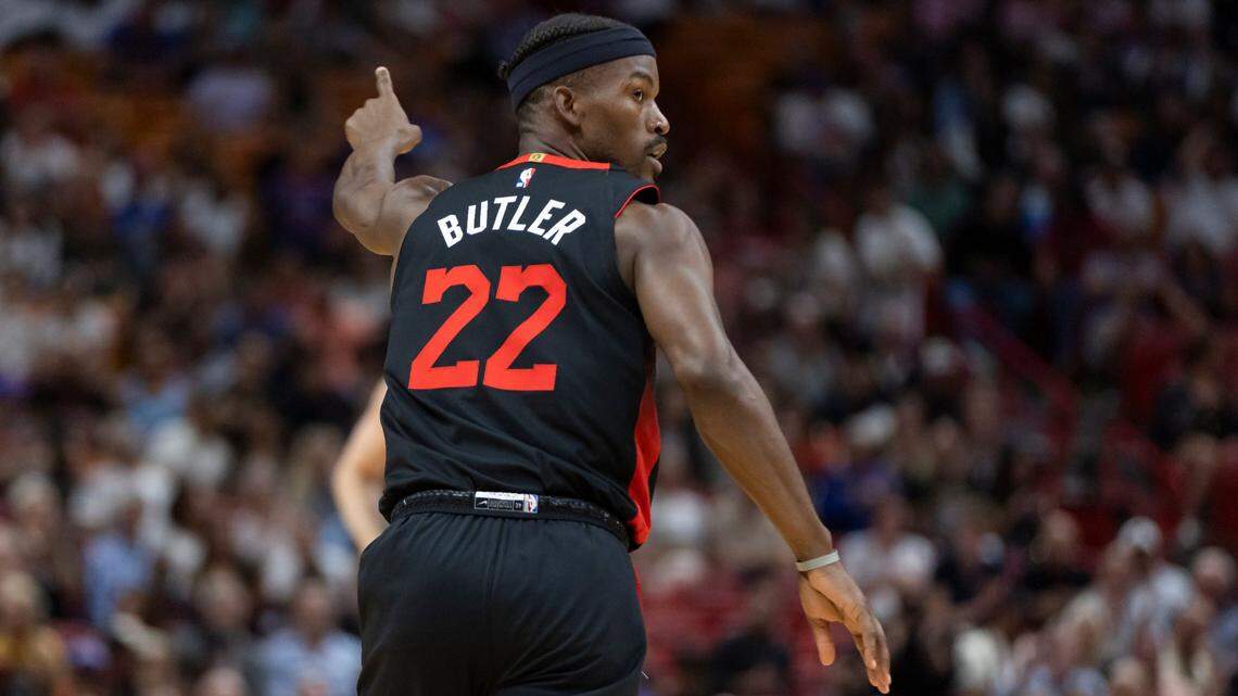 Miami Heat forward Jimmy Butler (22) gestures after scoring against the New York Knicks in the first half of their NBA game at Kaseya Center on April 2, 2024, in Miami.