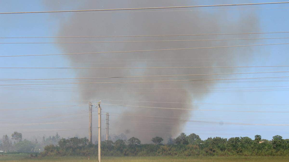 A smoke plume from a brush fire can be seen billowing in West Miami-Dade.