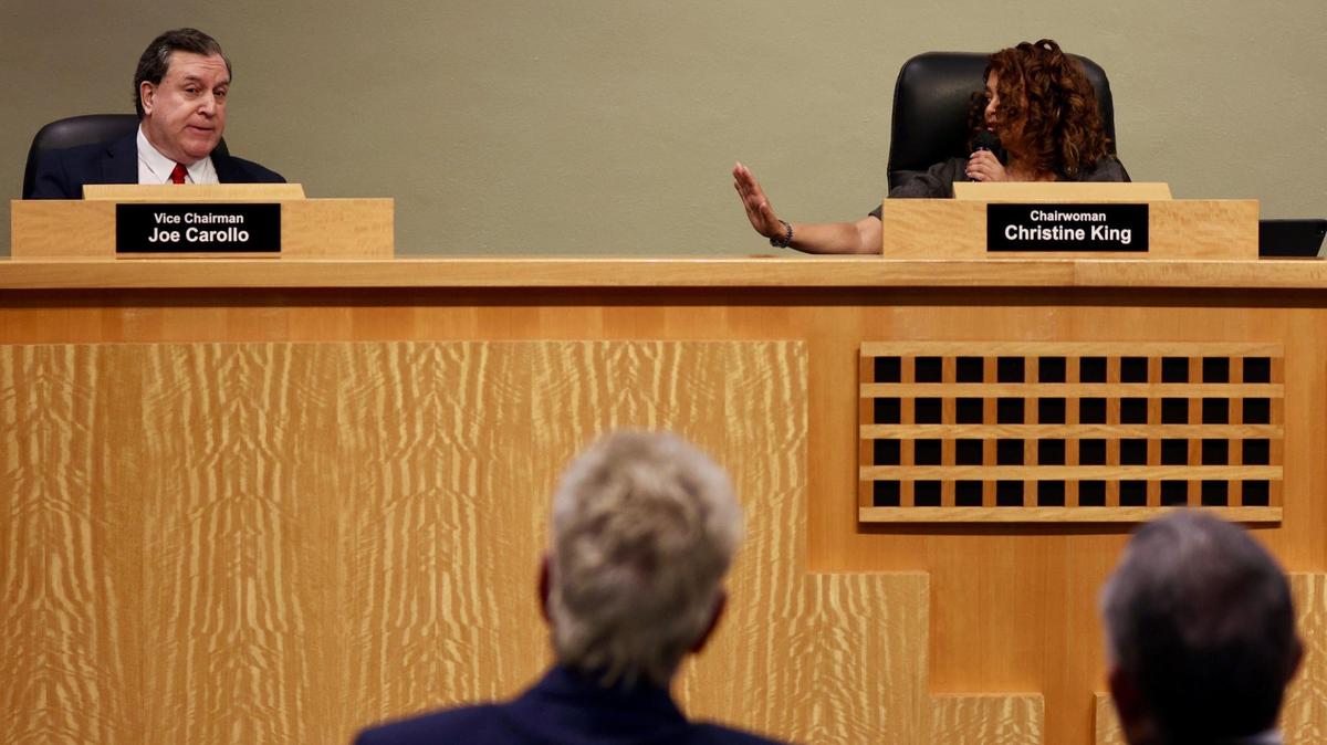 Miami Commissioner Joe Carollo, left, is told to hold his remarks by Commission Chairwoman Christine King during a special meeting regarding the city’s budget at Miami City Hall on Monday, December 11, 2023.