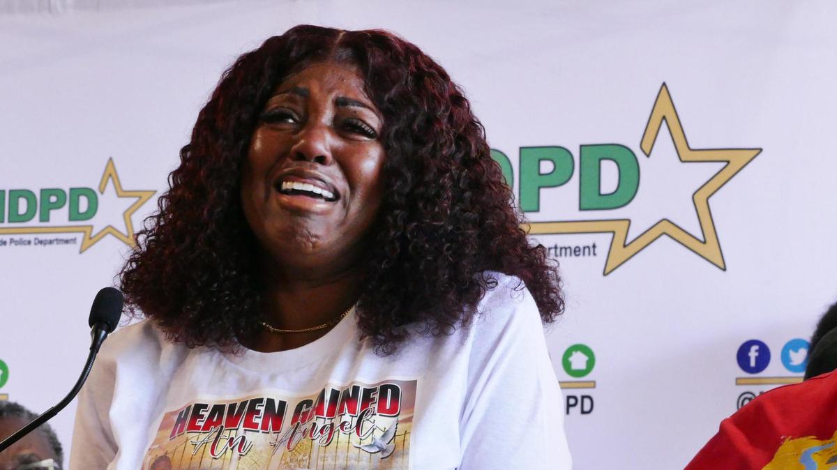 Donna Shaw, widow of Gregory Denard Shaw, 57, cries during a news conference at Miami-Dade Police Department’s headquarters in Doral on Tuesday, Nov. 7, 2023. Her husband was shot and killed outside an Opa-locka Burger King on Monday, Nov. 7, 2022.