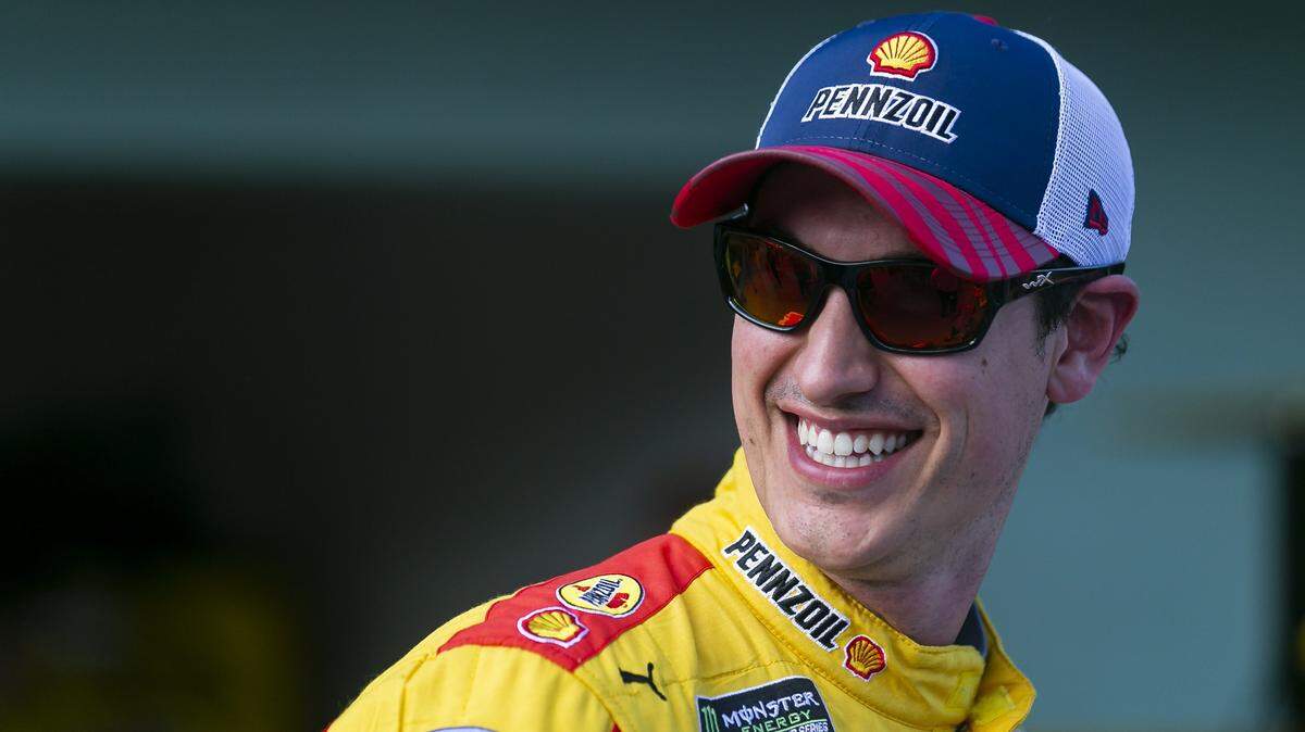 Joey Logano (22) talks with fans after participating in a practice before the start of the Homestead-Miami Speedway NASCAR 25th Annual Ford EcoBoost 300 Xfinity Series in Homestead, Florida on Saturday, Nov. 16, 2019.