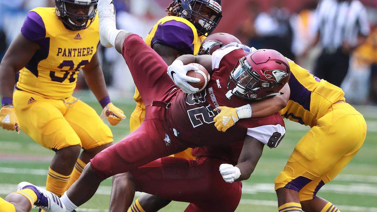 North Carolina Central tight end Josh McCoy is upended by Prairie View A&M defenders during the first quarter of the MEAC-SWAC Challenge college football game on Sunday, Sept. 2, 2018, in Atlanta, Ga. (Photo by Curtis Compton/Atlanta Journal-Constitution/TNS/Sipa USA)