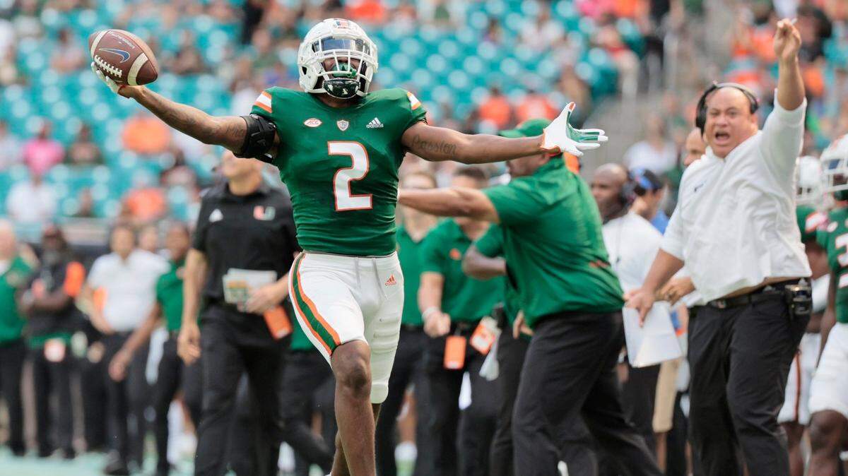 Miami Hurricanes cornerback Tyrique Stevenson (2) reacts after coming up with the football while tackling Duke Blue Devils wide receiver Eli Pancol (6) but the call was reversed in the first half at Hard Rock Stadium in Miami Gardens on Saturday, October 22, 2022.