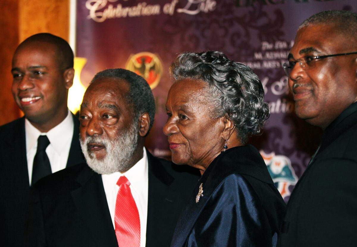 Local leaders (from left) Marlon Hill, H.T. Smith, Thelma Gibson and Bill Diggs pose for photos prior to the beginning of a program to honor them by the M. Athalie Range Cultural Arts Foundation in a tribute to her legacy. The event took place in Miami At the Gusman Theater in 2012. 