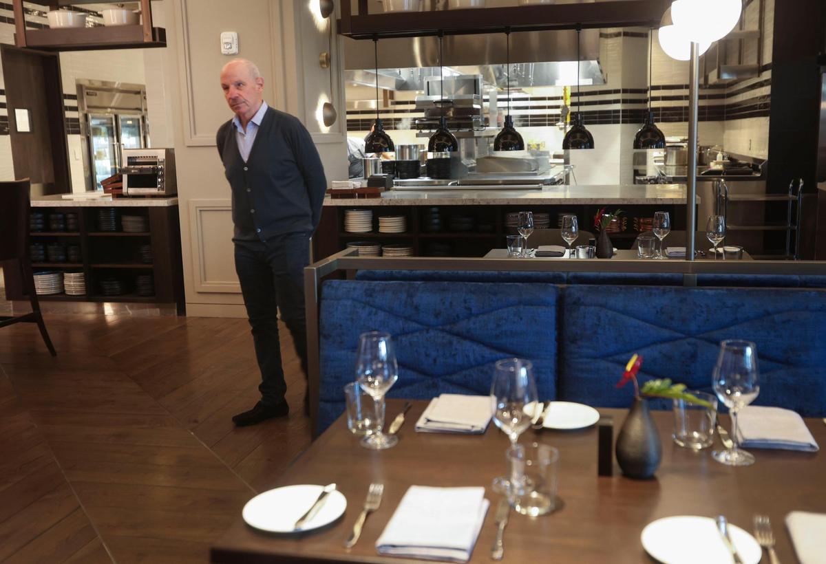 Jonathan Tisch, chairman and CEO of Loews Hotels, walks through the restaurant and bar area of the new Loews Coral Gables hotel on Wednesday, Nov. 2, 2022, the day before the hotel opens.