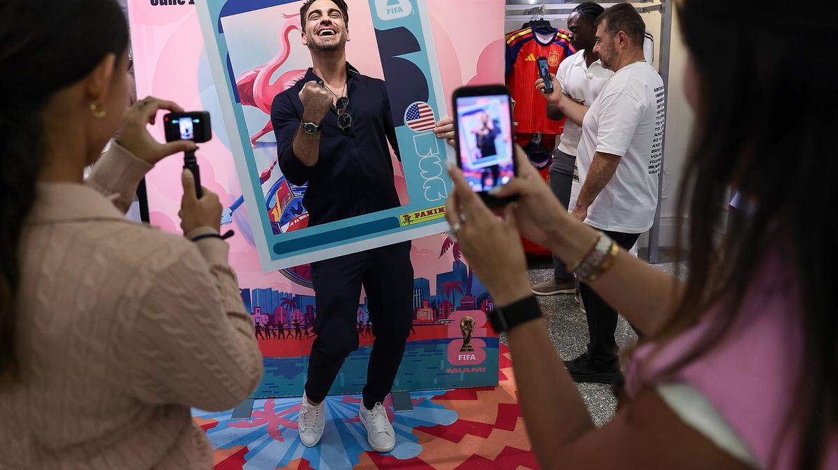 Telemundo TV host Frederik Oldenburg joins in the fun as influencers and creators from Miami and around the world attend the grand opening of the official FIFA World Cup store Monday on Lincoln Road in Miami Beach.