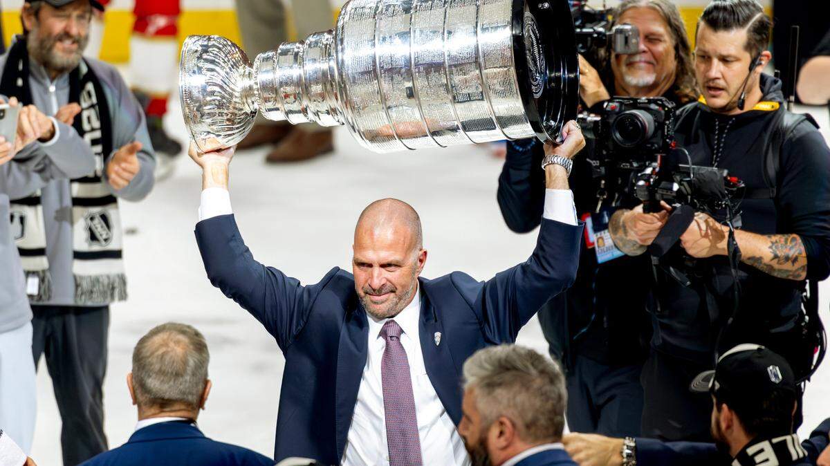 Florida Panthers General Manager, President of Hockey Operations Bill Zito lifts the Stanley Cup after defeating the Edmonton Oilers 5-1 in Game 6 of the Final at Amerant Bank Arena in Sunrise, Fla., on Tuesday, June 17, 2025, clinching the NHL championship.