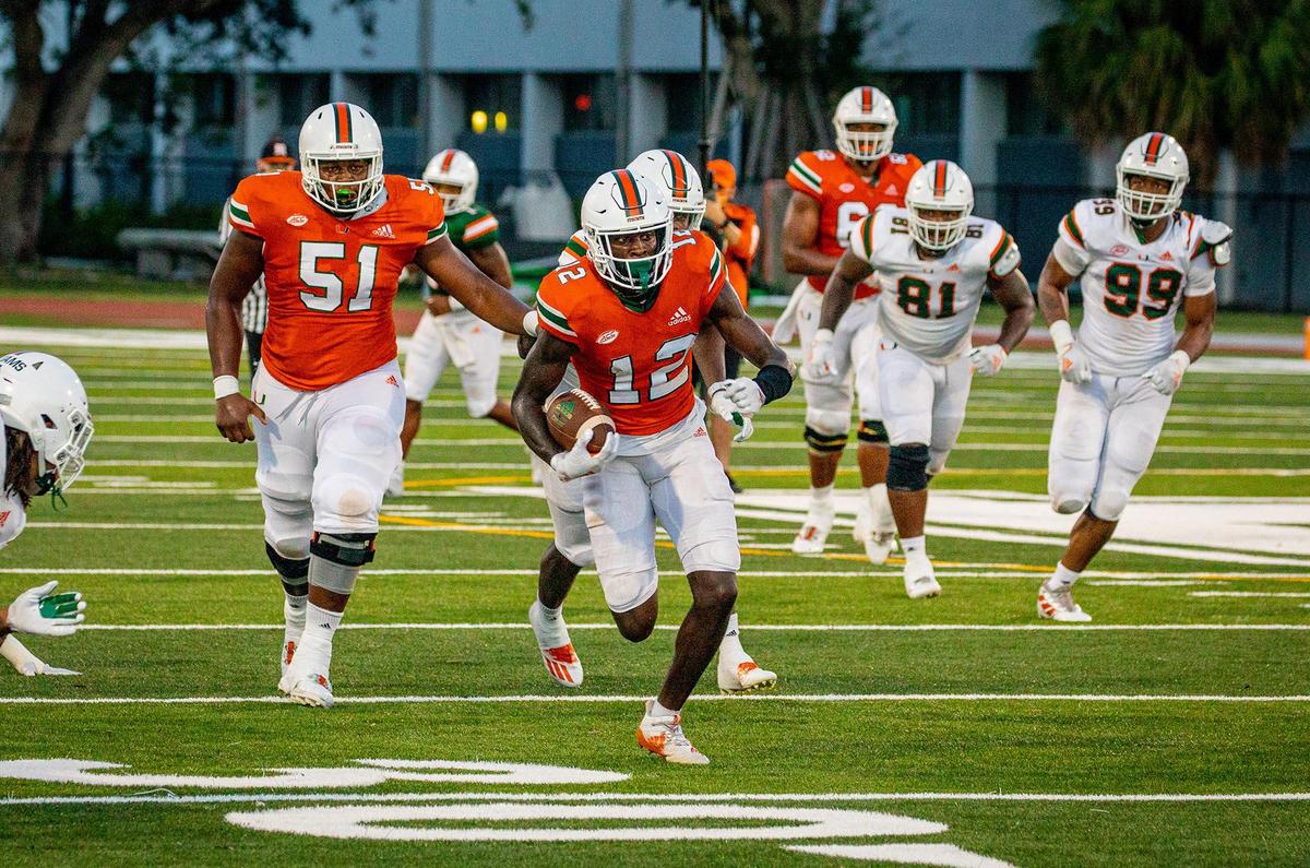 Jeremiah Payton (12) runs with the ball during UM’s scrimmage on Sunday, August 16, 2020.