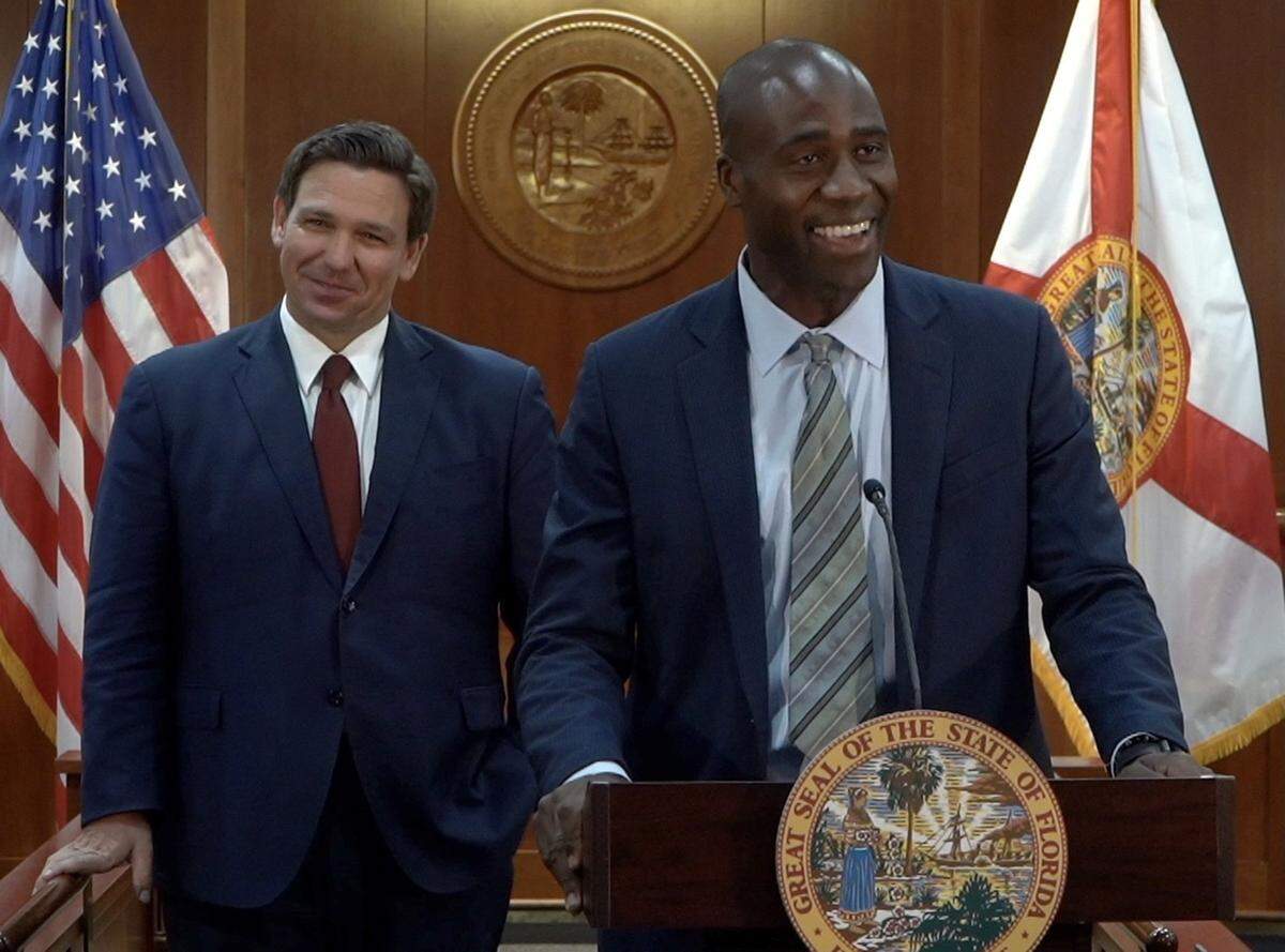 Dr. Joseph Ladapo, right, was appointed Florida’s surgeon general by Gov. Ron DeSantis in September 2021.