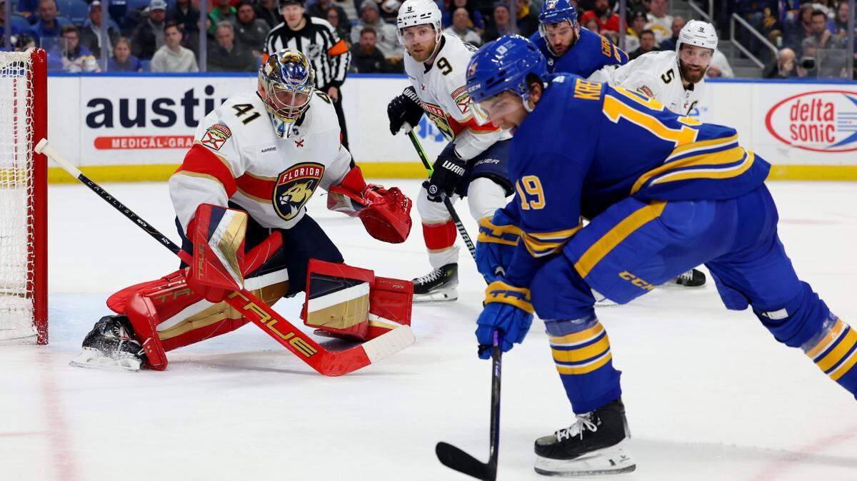Feb 15, 2024; Buffalo, New York, USA; Buffalo Sabres center Peyton Krebs (19) looks to take a shot on Florida Panthers goaltender Anthony Stolarz (41) during the second period at KeyBank Center. Mandatory Credit: Timothy T. Ludwig-USA TODAY Sports
