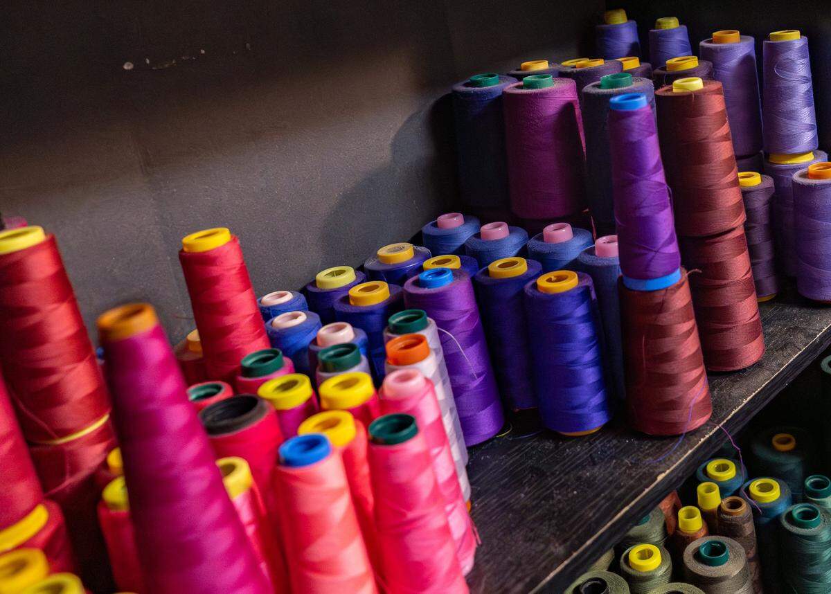 Spools of thread sit in the studio of Keva Johnson's head seamstress on Wednesday, May 27, 2026, in Miami, Florida.