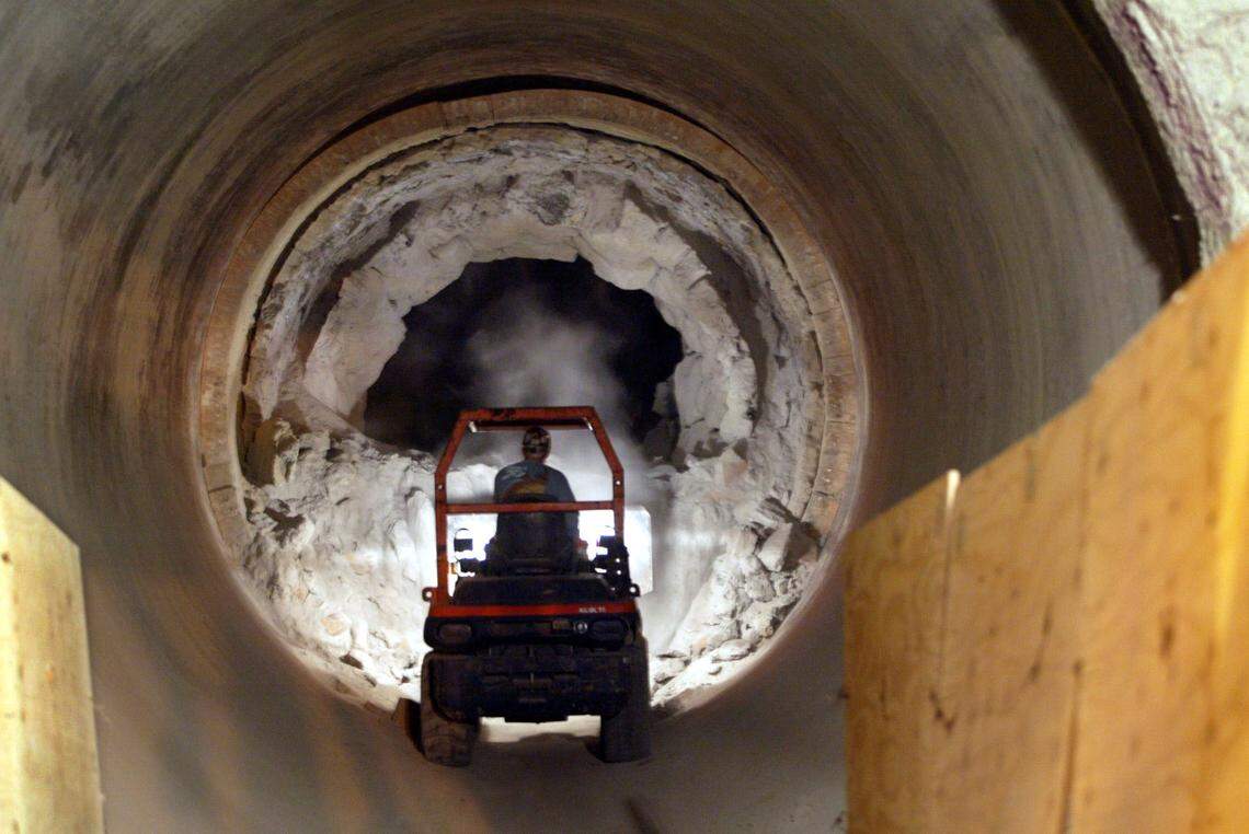 A worker does maintenance work on the kiln at the Pennsuco Titan America cement plant in Miami. Because of tremendous growth in the housing market demand the company operates 24 hours a day.