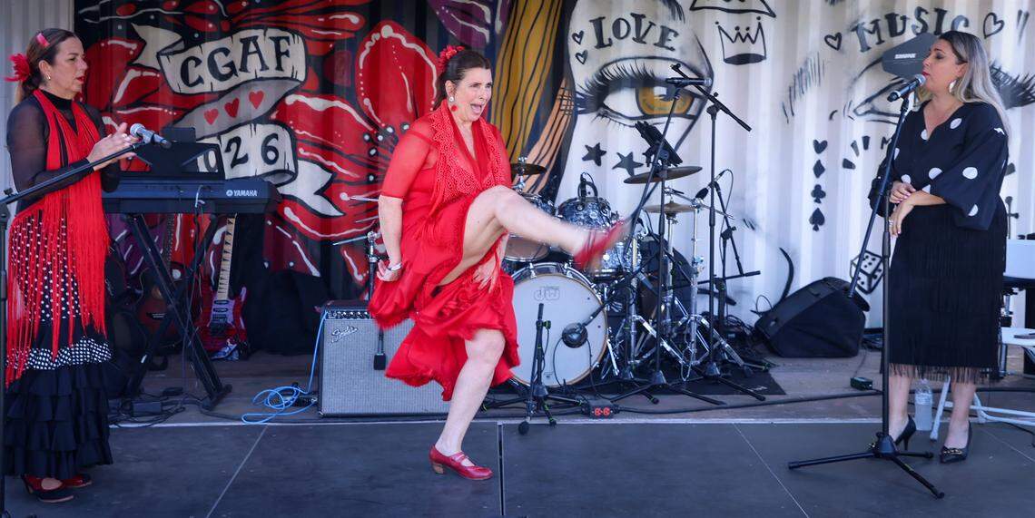 Members of Luna Cale USA - Monika Lange, left, Alessandra Torres, and Ana del Rocio, rights, showcase traditional Flamenco dance during the Coconut Grove Festival. 