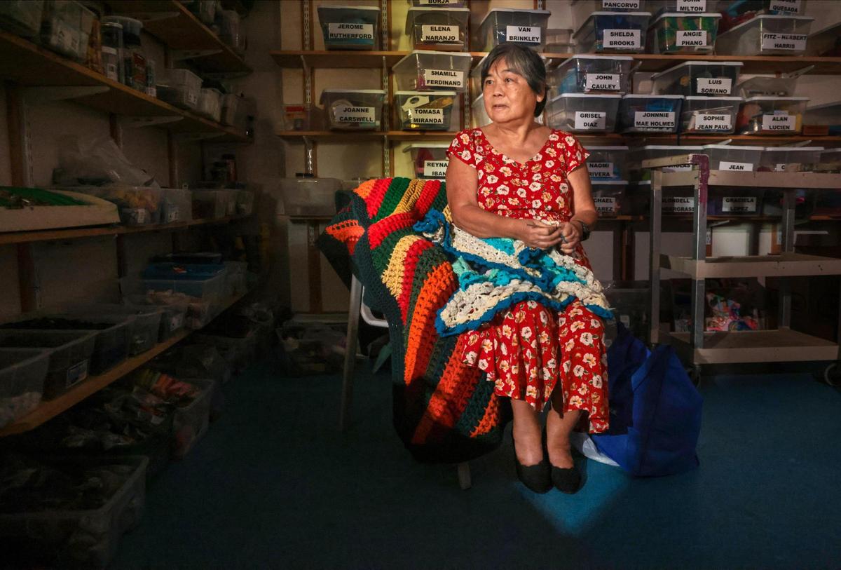 Angela Phang crochets a scarf on Tuesday, Oct. 1, 2022. Phang’s afghans have hung in museums in Coral Gables and were award winners in national art competitions and are auctioned for charities. “She’s a prime example for the blind community and vision impaired, that it’s possible to make art without sight and be competitive within the sighted community,” said her instructor at the Lighthouse, Aaron Hill.