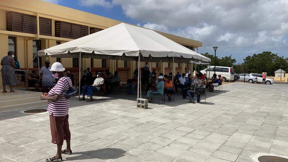 Residents in Antigua and Barbuda line up at the Glanvilles Polyclinic to get vaccinated on Thursday, March 4, 2021, with the AstraZeneca COVID-19 vaccine. The doses were donated by India.