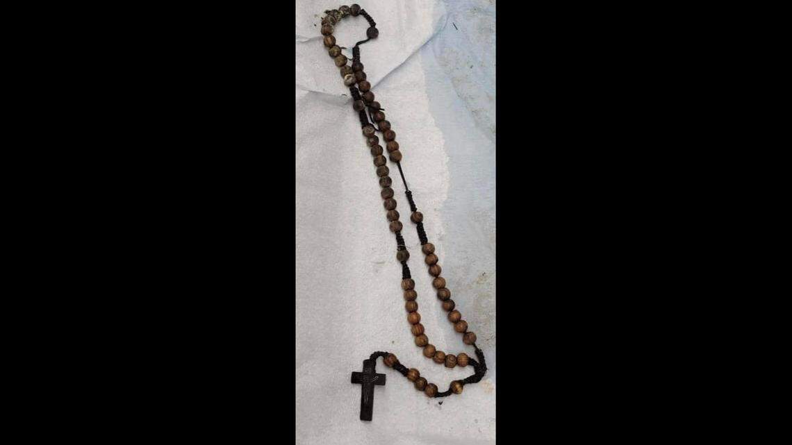The victim was wearing this rosary when he was found in an advanced stage of decomposition near Palm City, Florida, officials say.