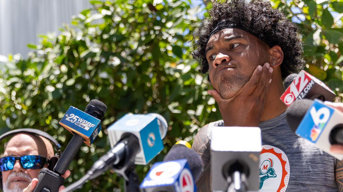 Miami Dolphins quarterback Tua Tagovailoa (1) speaks with the media during NFL mandatory minicamp at Baptist Health Training Complex in Hard Rock Stadium on Tuesday, June 4, 2024, in Miami Gardens, Fla.