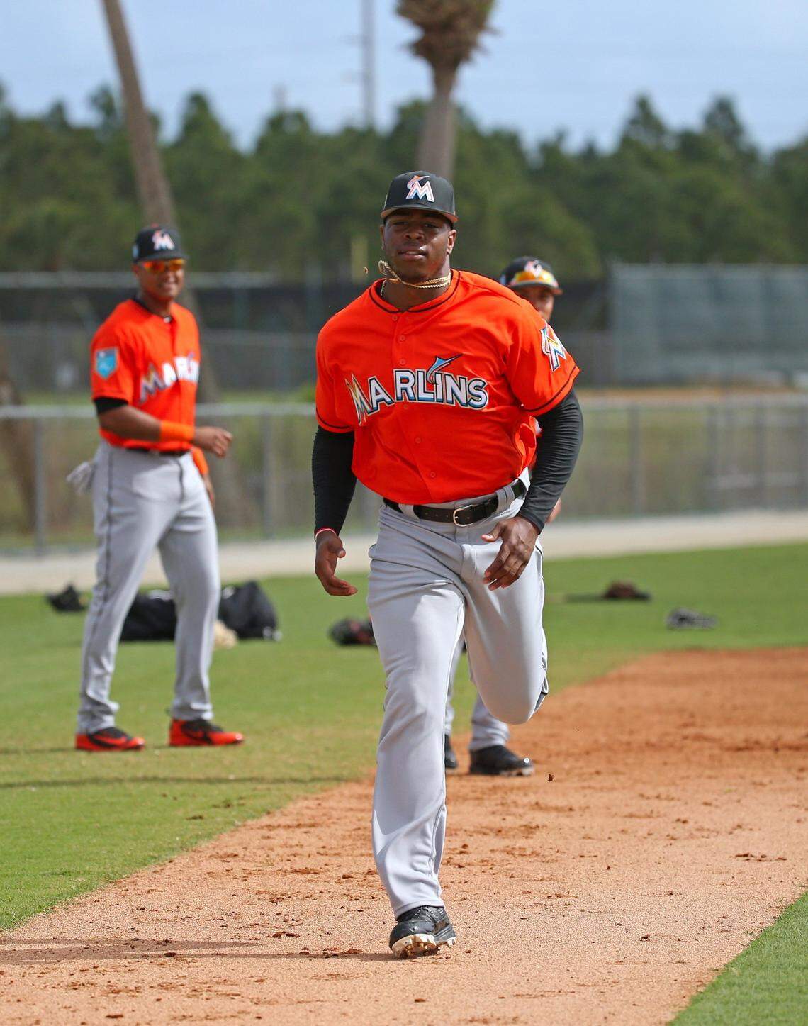 Miami Marlins outfielder Monte Harrison runs into home plate during the spring training baseball workouts at Roger Dean Stadium on Tuesday, Feb. 20, 2018, in Jupiter, Florida.