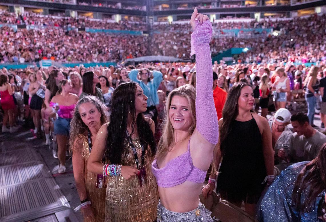 Savannah Veal, from Atlanta, Georgia, dances before Taylor Swift performs onstage during The Eras Tour at Hard Rock Stadium on Friday, Oct. 18, 2024, in Miami Gardens, Fla.