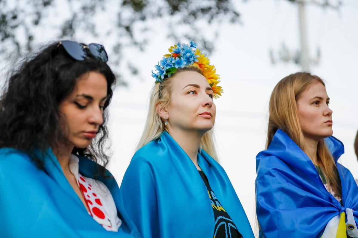 Oksana Zaskalna, 36, looks on during a moment of silence during a vigil to support Ukrainians affected by the Russian invasion of Ukraine at St Nicholas Ukrainian Orthodox Church, 5031 SW 100th Ave., in Cooper City, Florida.