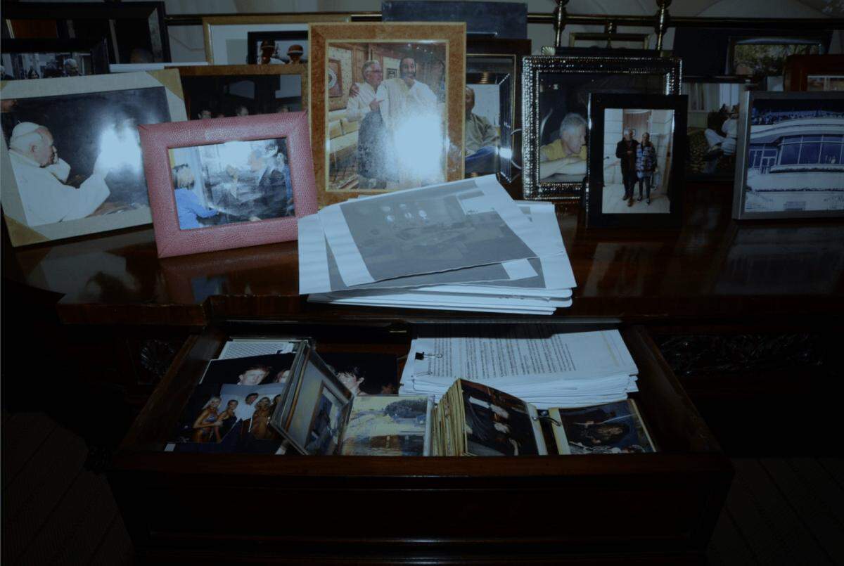 A photograph released by the Department of Justice and subsequently removed showing photographs from one of Jeffrey Epstein’s home which included pictures of President Donald Trump and former President Bill Clinton