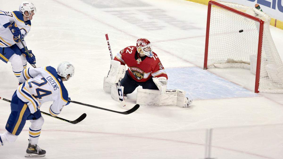 Buffalo Sabres center Dylan Cozens (24) scores on Florida Panthers goaltender Sergei Bobrovsky (72) in the first period at the FLA Live Arena in Sunrise on Thursday, December 02, 2021.