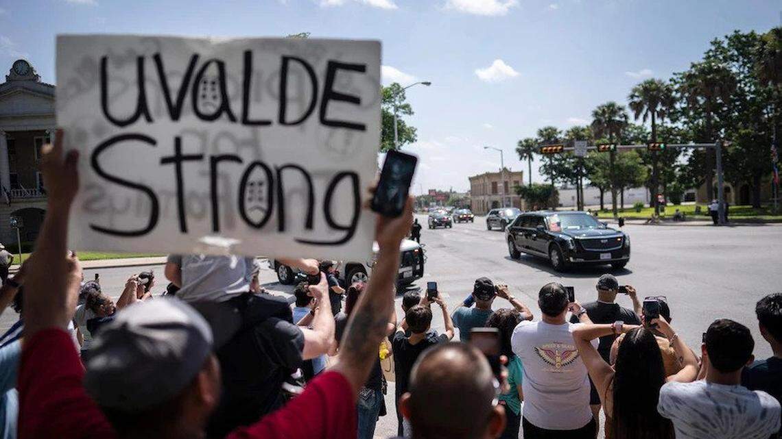 President Biden’s limousine passes a memorial site in Uvalde’s town square en route to Robb Elementary School on May 29.