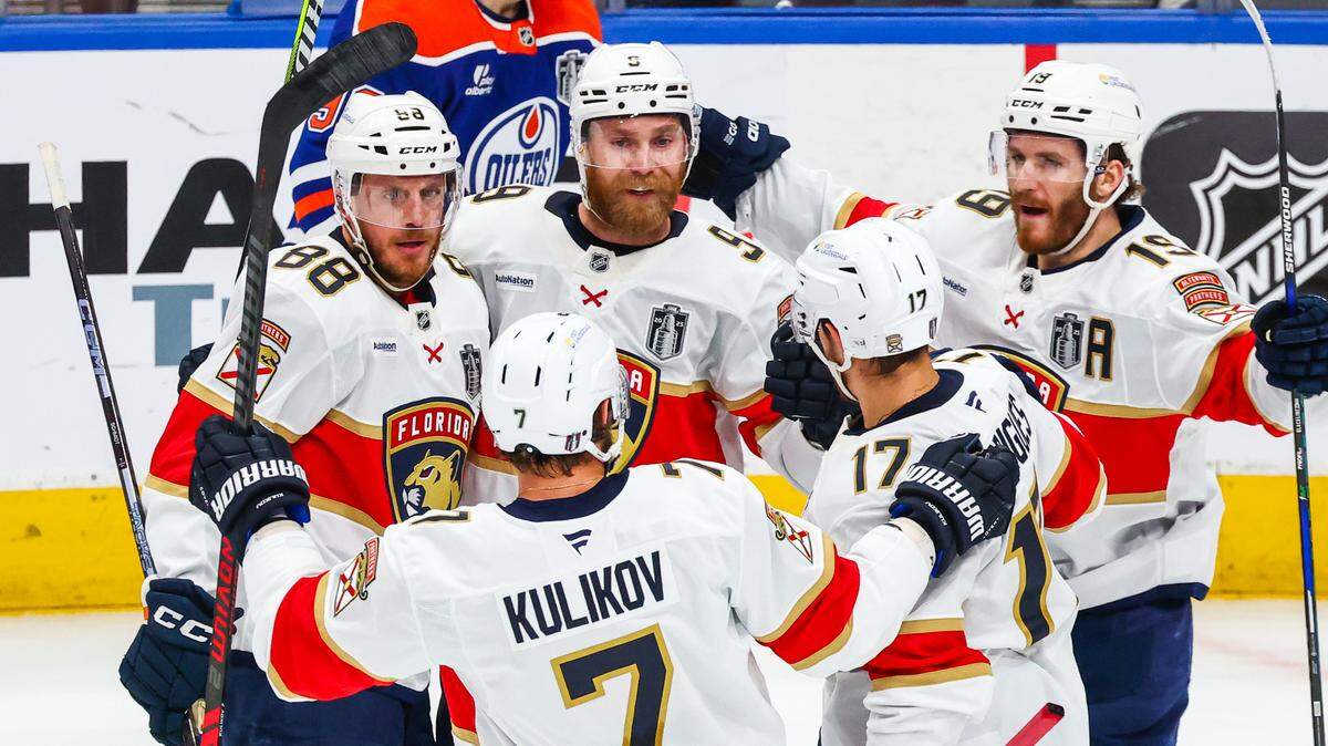 Jun 14, 2025; Edmonton, Alberta, CAN; Florida Panthers center Sam Bennett (9) celebrates his goal with teammates against the Edmonton Oilers during the first period in game five of the 2025 Stanley Cup Final at Rogers Place. Mandatory Credit: Sergei Belski-Imagn Images
