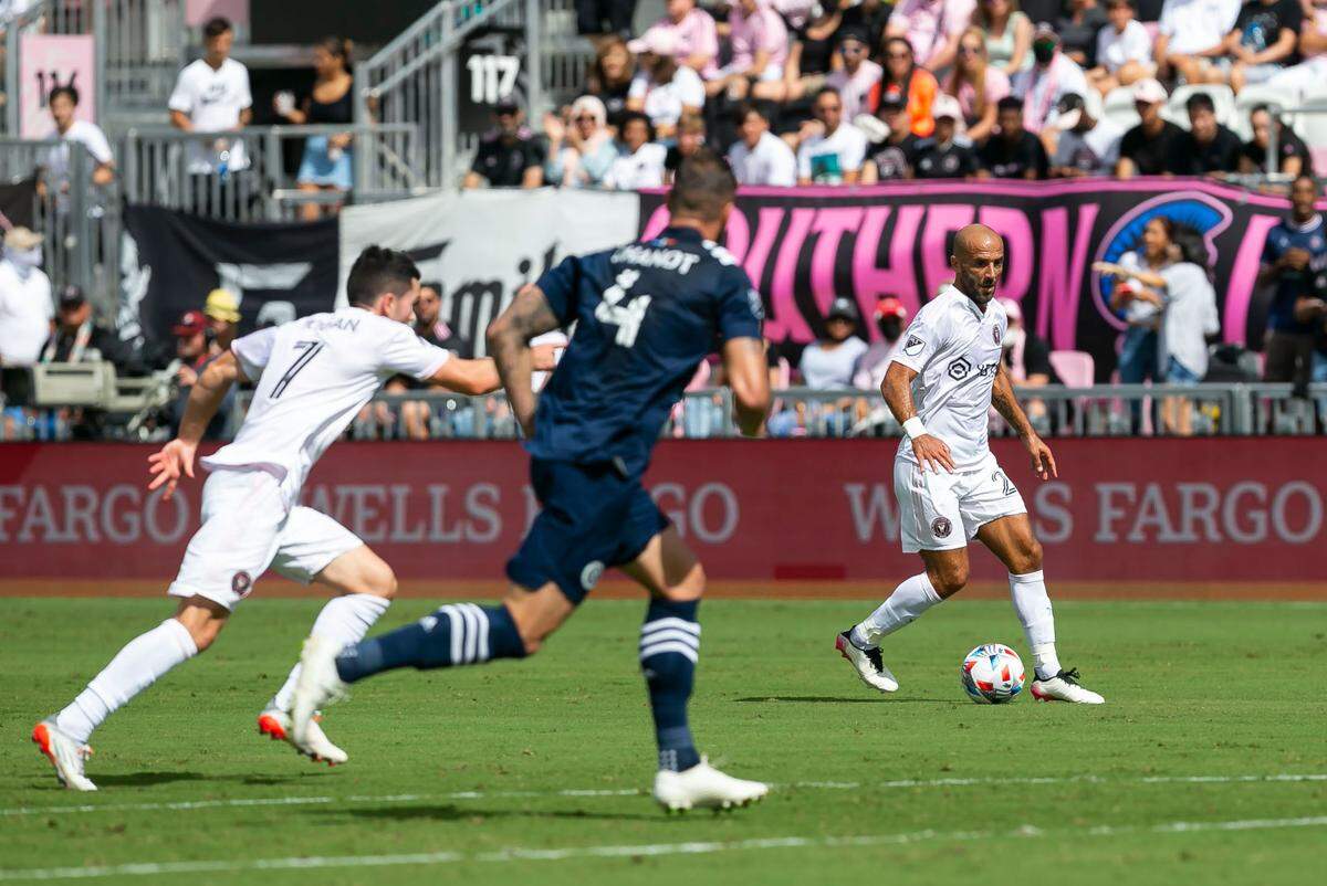 Inter Miami forward Federico Higuain (22) looks to pass to midfielder Lewis Morgan (7) against New York City FC New York City defender Maxime Chanot (4) during the first half of their MLS soccer match at DRV PNK Stadium on Saturday, October 30, 2021, in Fort Lauderdale, Florida.