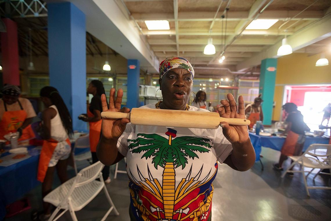 Chef Angie Thomas teaches a cooking class hosted by Eatwell Exchange, a Miami nonprofit that teaches family how to prepare healthy meals from their homeland, at the Little Haiti Cultural Complex.