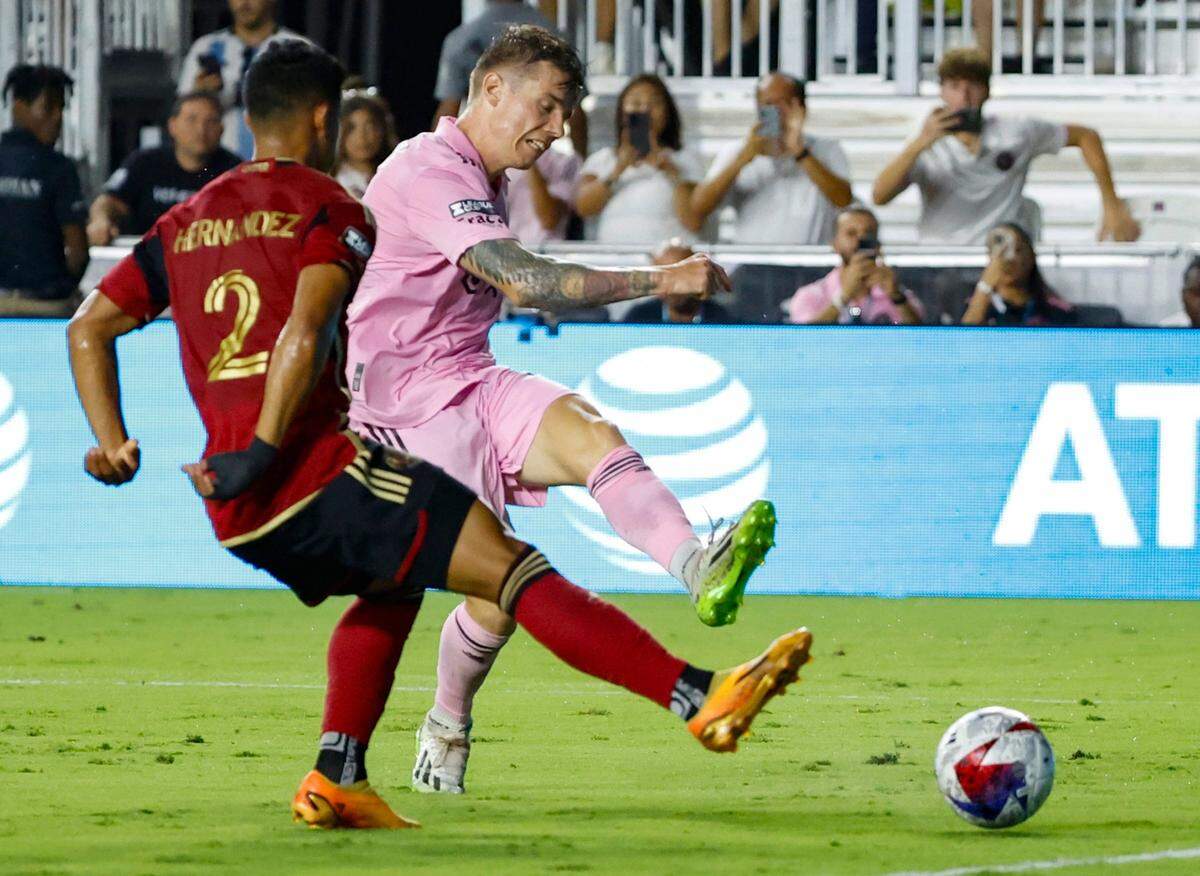 Inter Miami midfielder Robert Taylor (16) kicks to score in the second half as Atlanta United defender Ronald Hernández (2) defends.