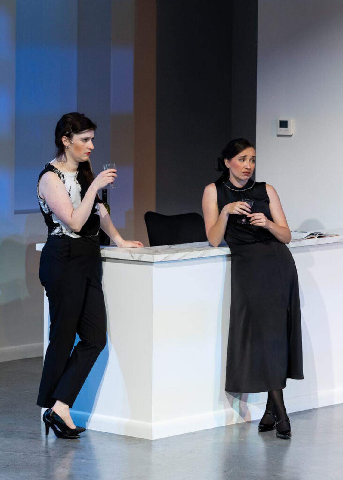 Liba Vaynberg and Krystal Millie Valdes as assistants in a Miami gallery in “Bad Dog,” a new play at Miami New Drama.