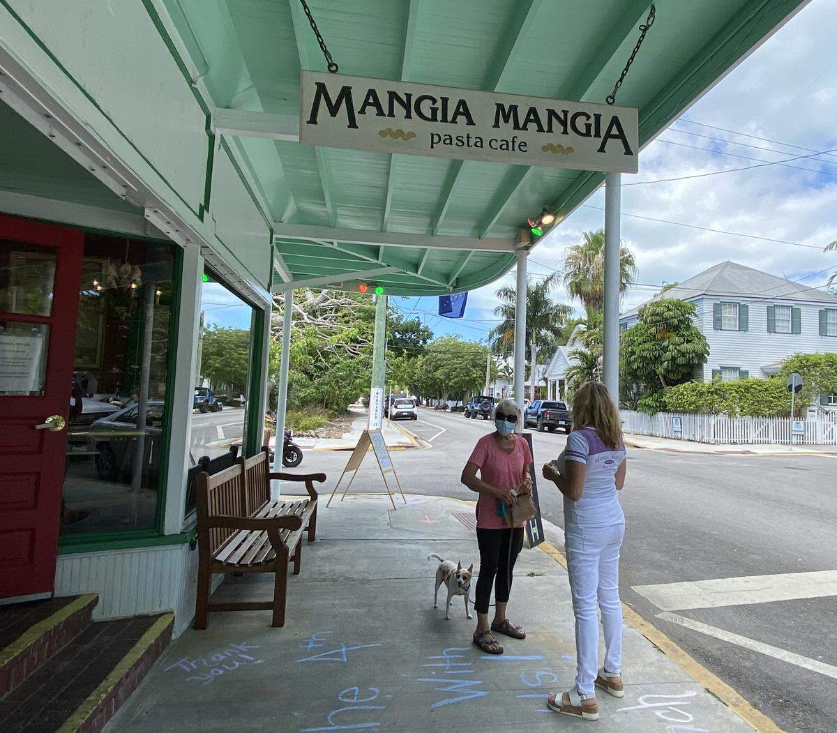 Heather Barnes sells a sandwich during lunchtime at Mangia Mangia restaurant, 900 Southard St., on May 4, 2020. The longtime restaurant had never done lunch before May 4.