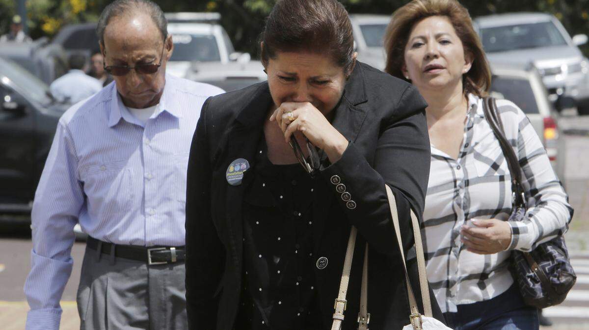 Relatives of three journalists kidnapped along the border with Ecuador and Colombia arrive to meet with Ecuador's President Lenin Moreno in Quito, Ecuador, Friday, April 13, 2018.