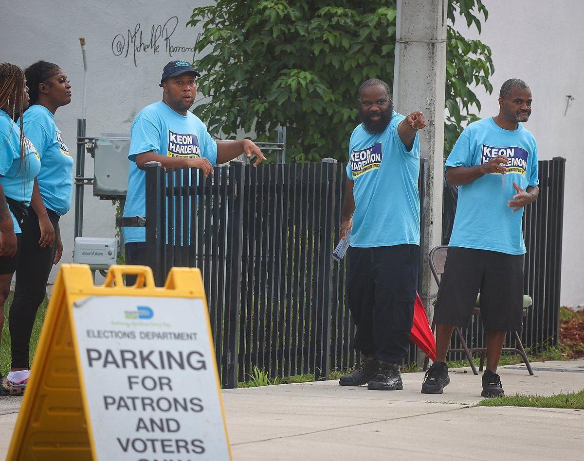 Campaign workers gather across the street for early voting at the Little Haiti Cultural Center in Miami, Florida, one of 23 polling sites that will be open from Aug. 5 to Aug. 18, 2024, as part of the early voting period before the Aug. 20 primary election in Florida.