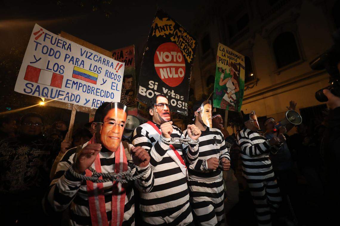 Demonstrators take part in a march against corruption in Lima, Peru, in 2018.
