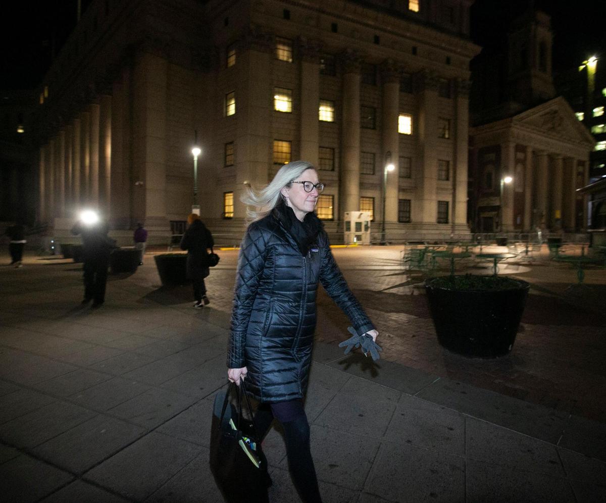 A member of Ghislaine Maxwell’s defense team, Laura Menninger, leaves the courthouse Monday evening , Dec. 20, 2021, as closing arguments in the case concluded and the jury began deliberations .